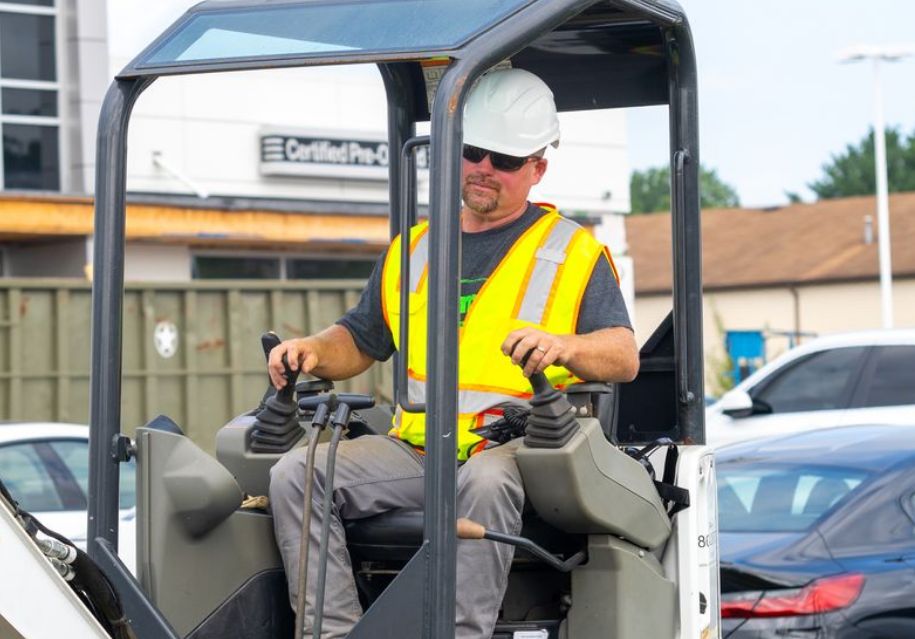 Worker operating machinery