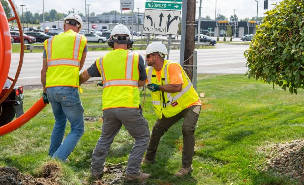 workers installing a pipe